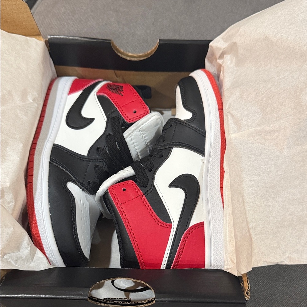 Jordan Kids Black, White, and Red Sneakers